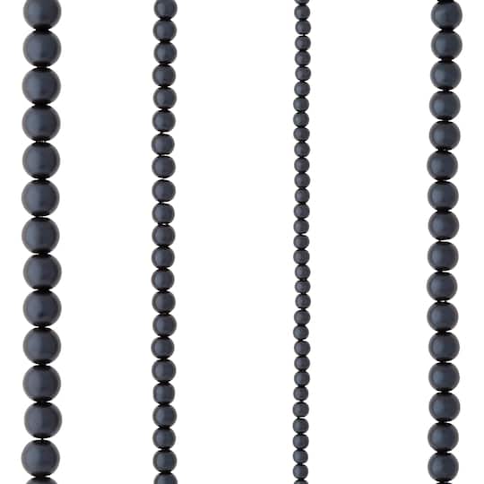 black beads for dress A black dress with a bodice decorated with pearl beads